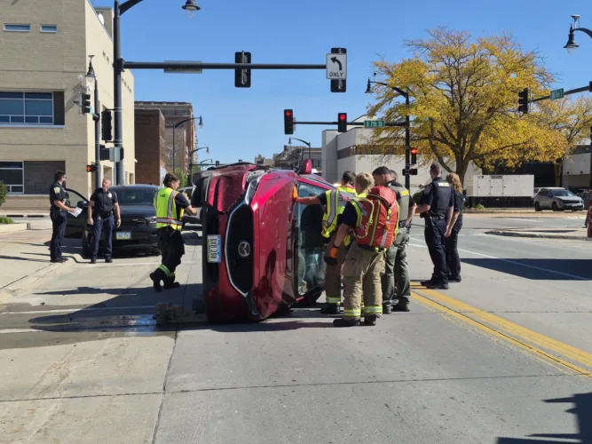 Car flips on side; no injuries reported